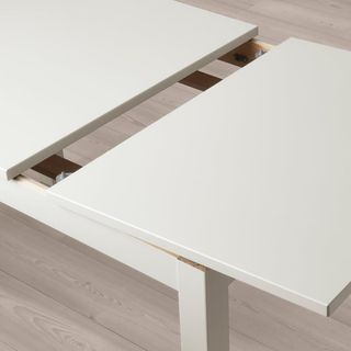 Mesa de comedor blanca de madera