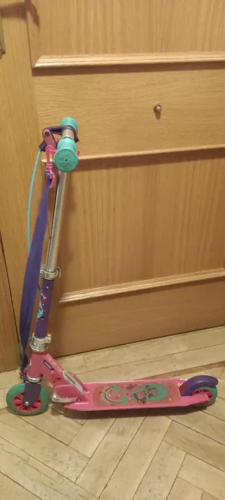 Patinete Oxelo rosa con correa y freno