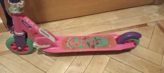 Patinete Oxelo rosa con correa y freno