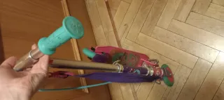 Patinete Oxelo rosa con correa y freno