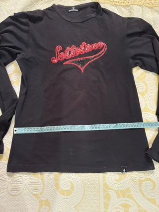 Maglia Sottotono nera con paillettes