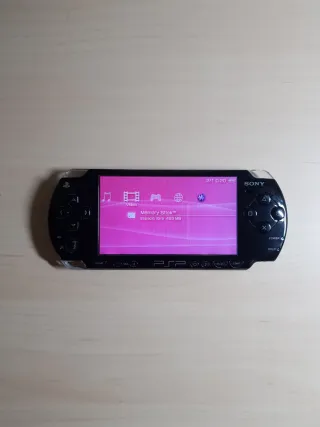 PSP negra sin cargador con tarjeta de memoria SONY