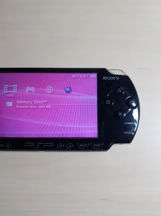 PSP negra sin cargador con tarjeta de memoria SONY