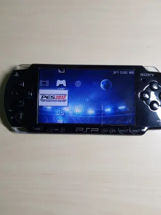 PSP negra sin cargador con tarjeta de memoria SONY