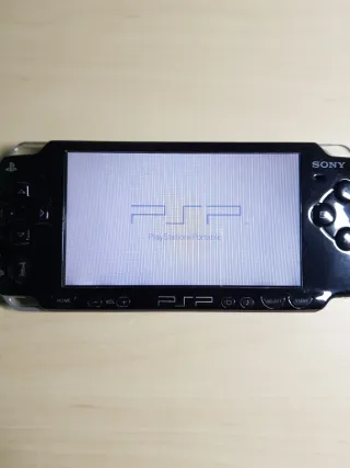 PSP negra sin cargador con tarjeta de memoria SONY