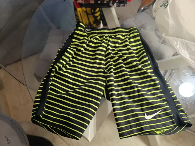 Pantalón deportivo Nike rayas amarillo y negro