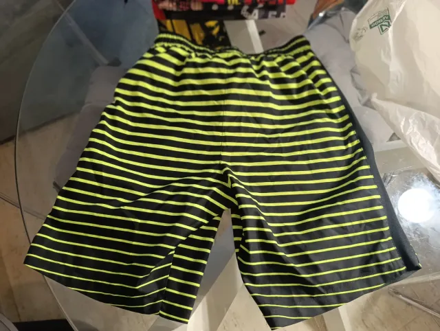 Pantalón deportivo Nike rayas amarillo y negro