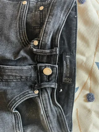 Pantalón vaquero flare negro mujer