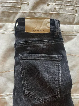 Pantalón vaquero flare negro mujer