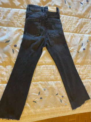 Pantalón vaquero flare negro mujer