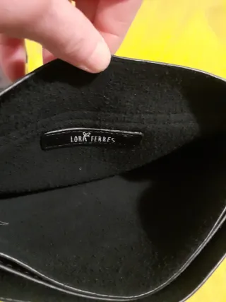 Borsetta nera con chiusura metallica