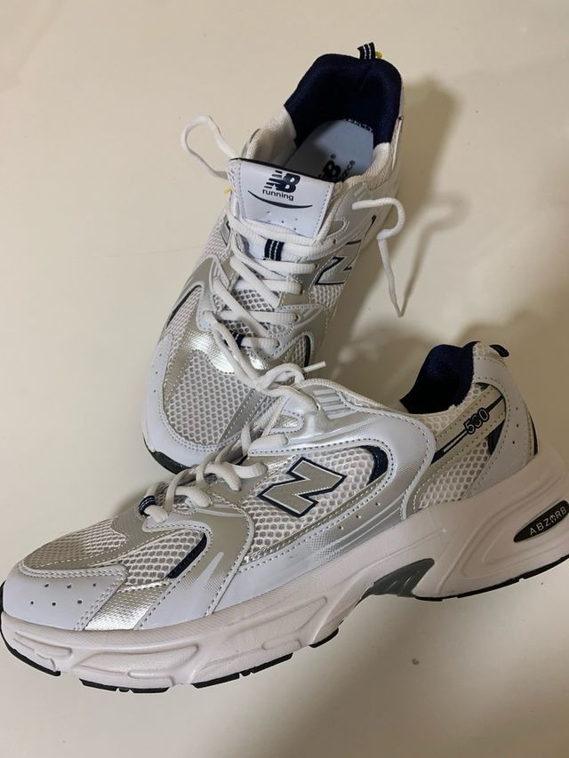 Zapatillas New Balance Running Blancas y Plateadas