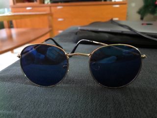 Gafas de sol Ray-Ban azules y doradas