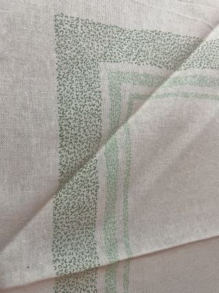 Tovaglia rotonda con tovaglioli