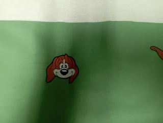 Funda bordada a máquina con perros