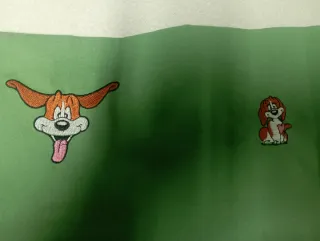 Funda bordada a máquina con perros