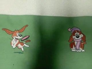 Funda bordada a máquina con perros