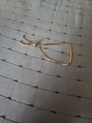 Pulsera dorada ajustable