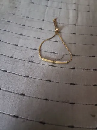 Pulsera dorada ajustable