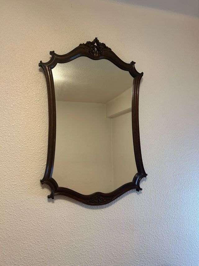 Espejo de madera tallada