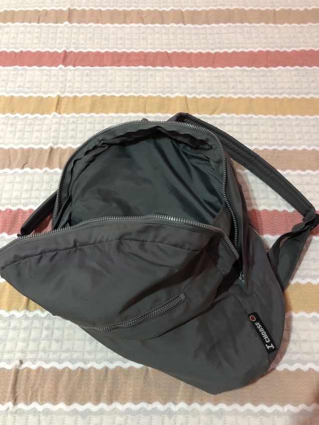 Mochila Chaqueta Gris,chubasquero .