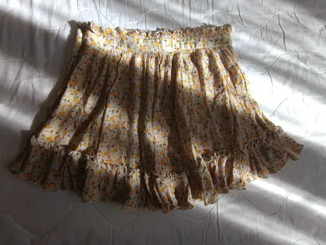 Falda floral beige y amarilla