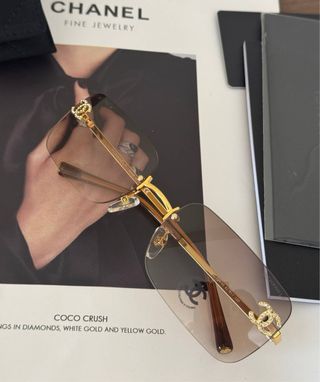 Gafas de sol Chanel doradas y marrones