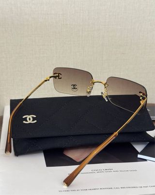 Gafas de sol Chanel doradas y marrones