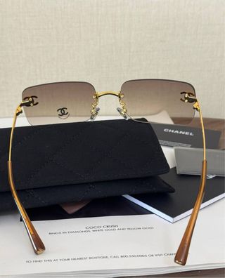 Gafas de sol Chanel doradas y marrones