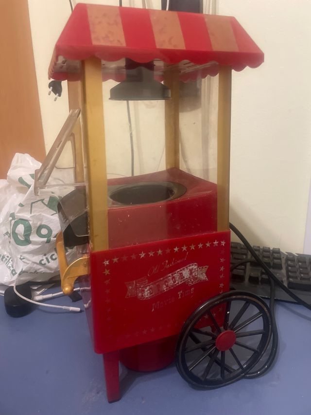 Máquina de palomitas roja y dorada