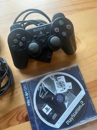 PlayStation 2 Nera + 3 Giochi