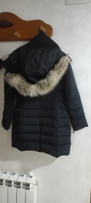 Plumas negras acolchadas