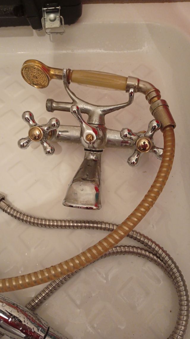 Grifería ducha antigua teléfono