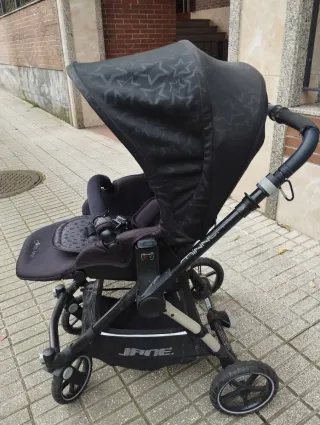 Silla y capazo bebé negro de Jané