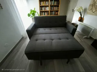 Sofá cama gris de tela