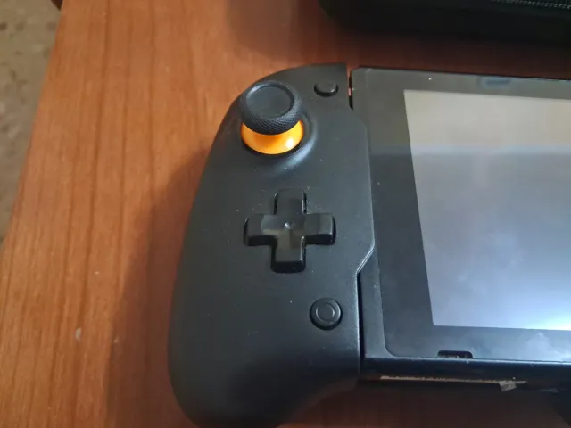 Nintendo Switch V1 + Mando Grip + Funda