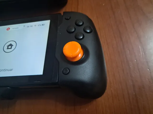 Nintendo Switch V1 + Mando Grip + Funda