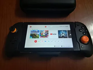 Nintendo Switch V1 + Mando Grip + Funda