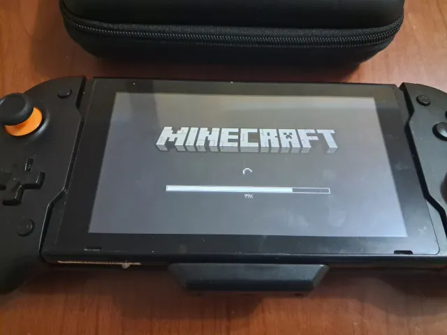 Nintendo Switch V1 + Mando Grip + Funda