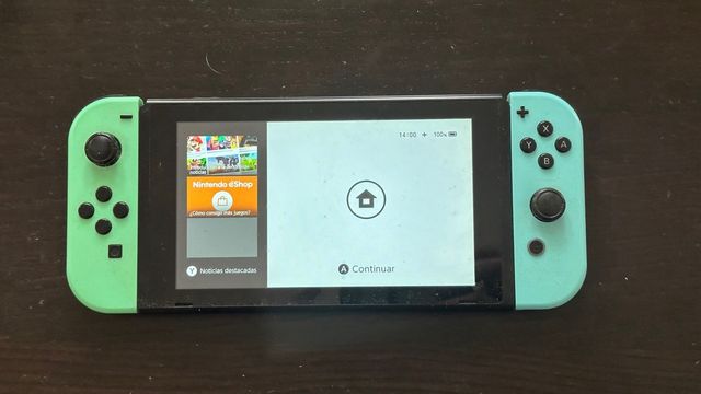 Nintendo Switch+mandos+MicroSD+funda+extras