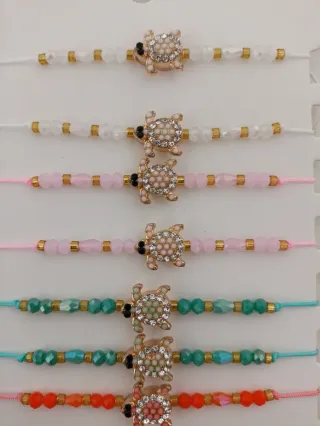 Pulsera Bolas Tortuga Dorada y Rosa