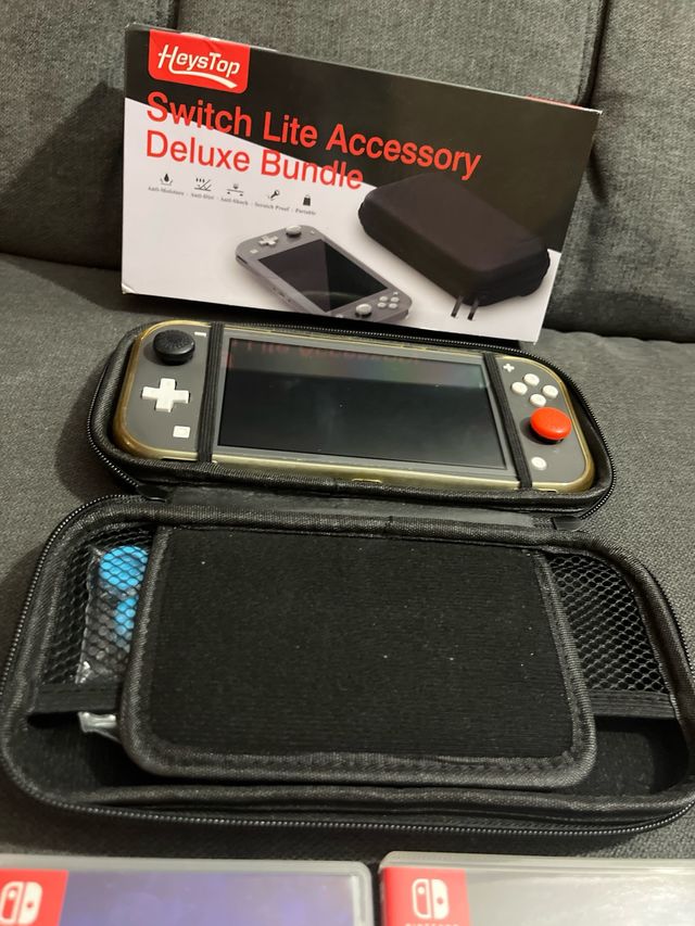 Nintendo Switch Lite + Accesorios y Juegos