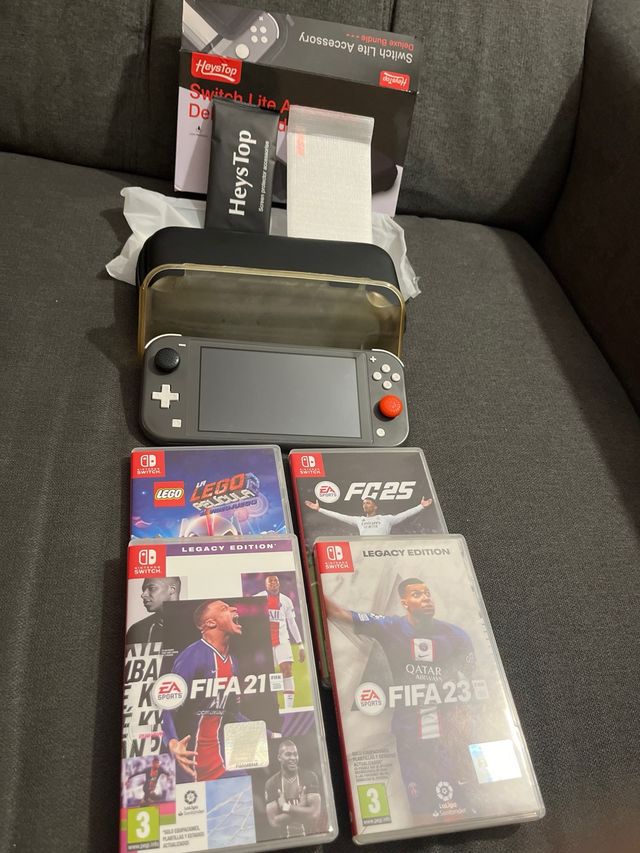 Nintendo Switch Lite + Accesorios y Juegos