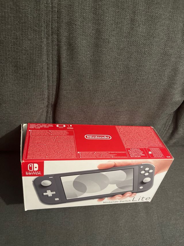 Nintendo Switch Lite + Accesorios y Juegos