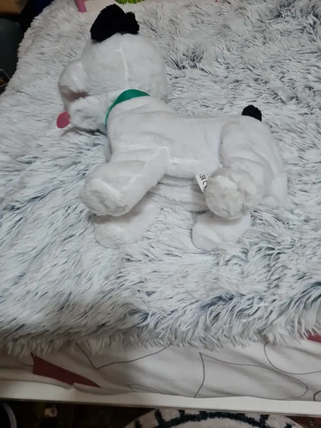 Perro de juguete que ladra y lame