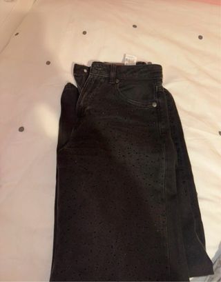 Pantalones negros con brillo