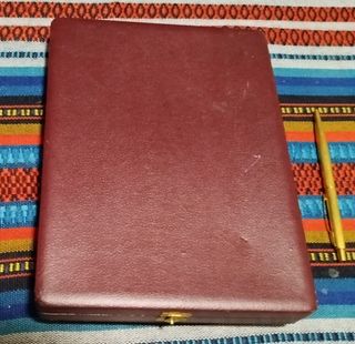 Cartera y pitillera piel serpiente con caja