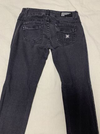 Pantalones vaqueros negros con cremallera