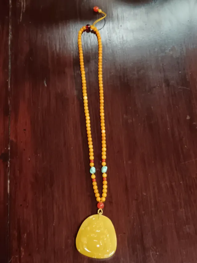 Collana in stile asiatico con pendente di Buddah