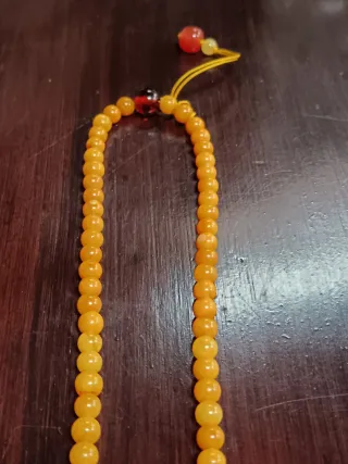 Collana in stile asiatico con pendente di Buddah